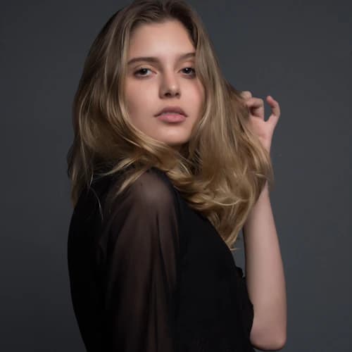 Female editorial model portrait in warm light