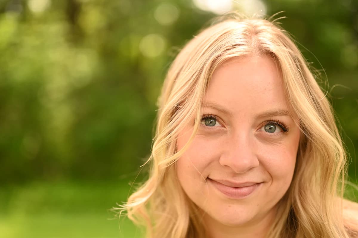 Relaxed natural portrait in soft daylight, showing the ordinary left-right differences present in every face