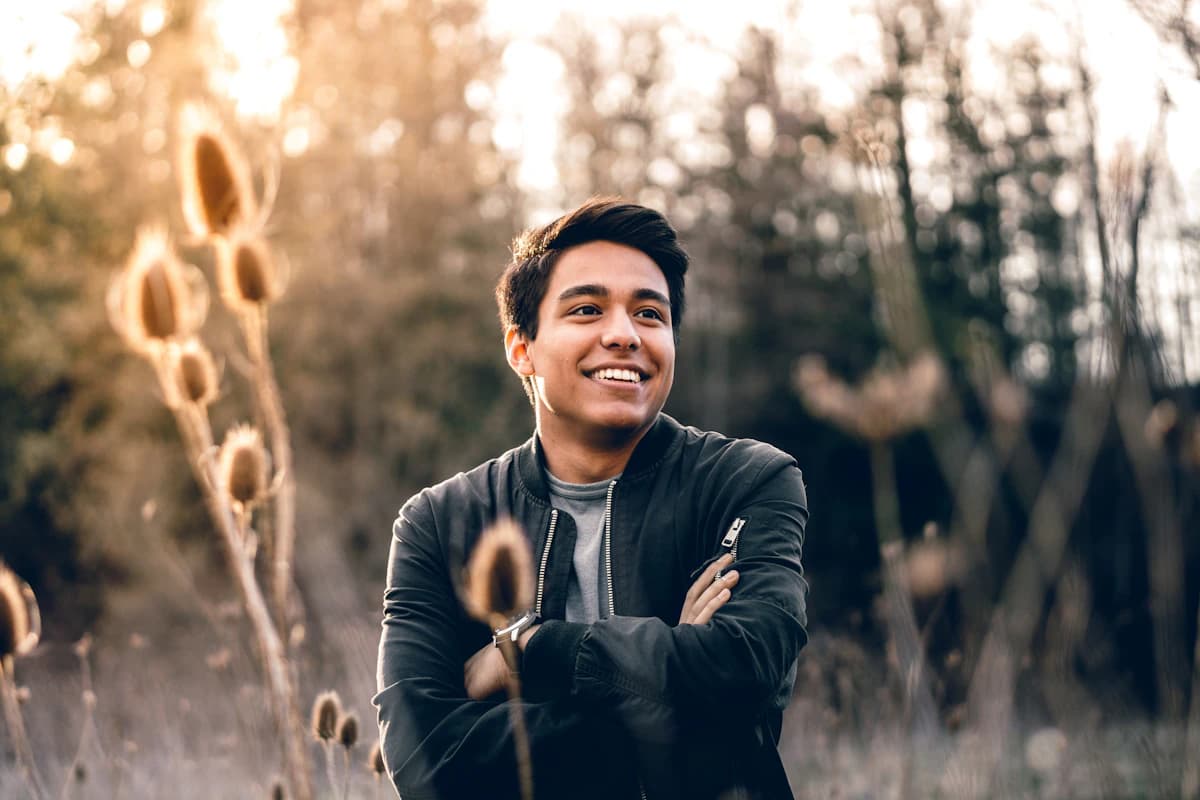 Relaxed natural portrait in daylight, illustrating the mild facial asymmetry present in every human face